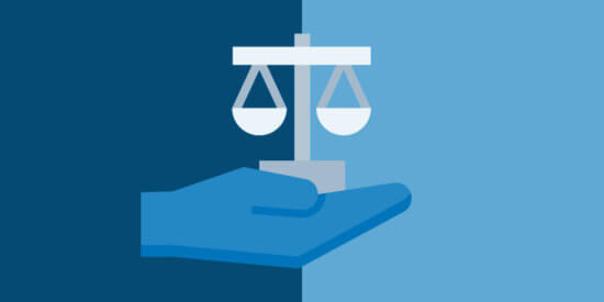 An image of a hand holding a scales, showing how lawyers can increase access to justice for vulnerable clients