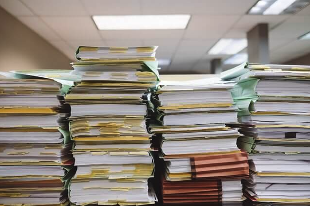 Stacks of paper in a law firm