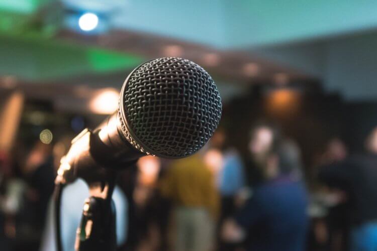 Public speaking is one valuable way to network as an attorney
