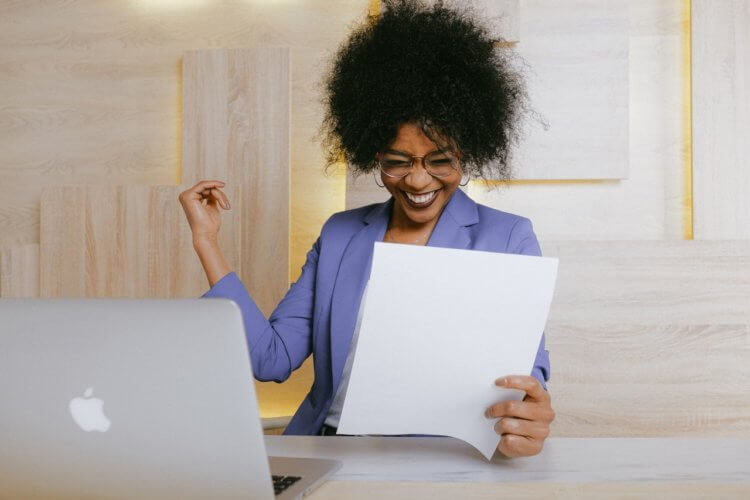 happy lawyer looking at a document