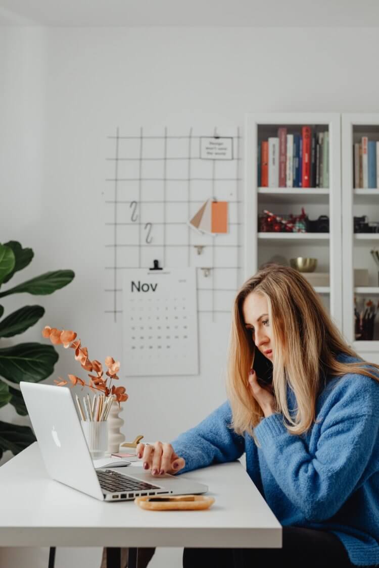 woman working remotely on a laptop