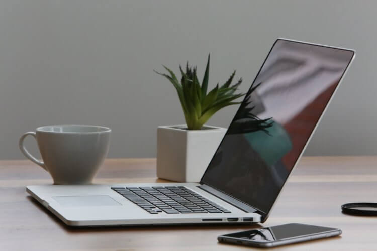 macbook pro laptop on a desk
