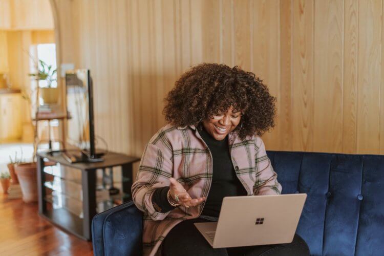 A photo of a legal professional on a work call from home