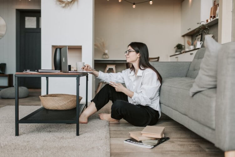 Woman reviewing case management software online