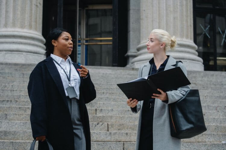 Lawyers standing outside a court