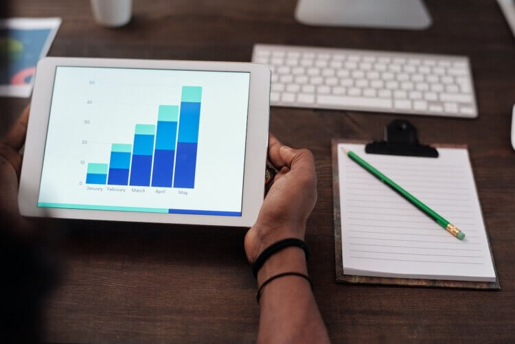 Lawyer reviewing graphs at desk