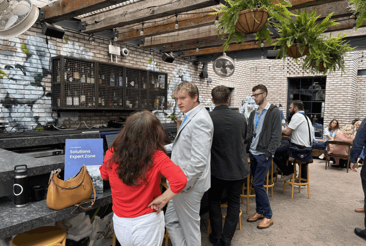 People chatting at an event