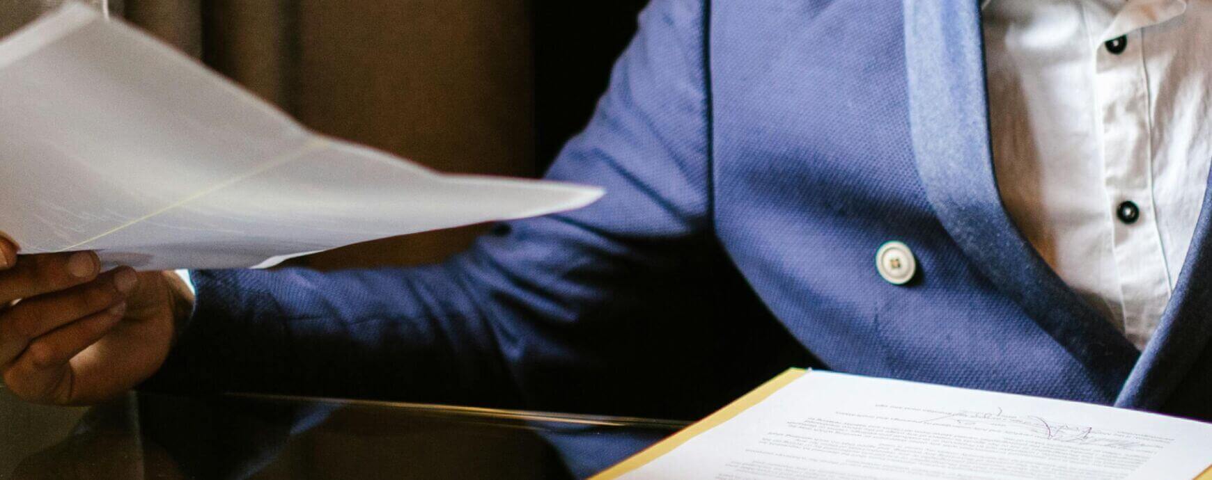 Lawyer holding piece of paper