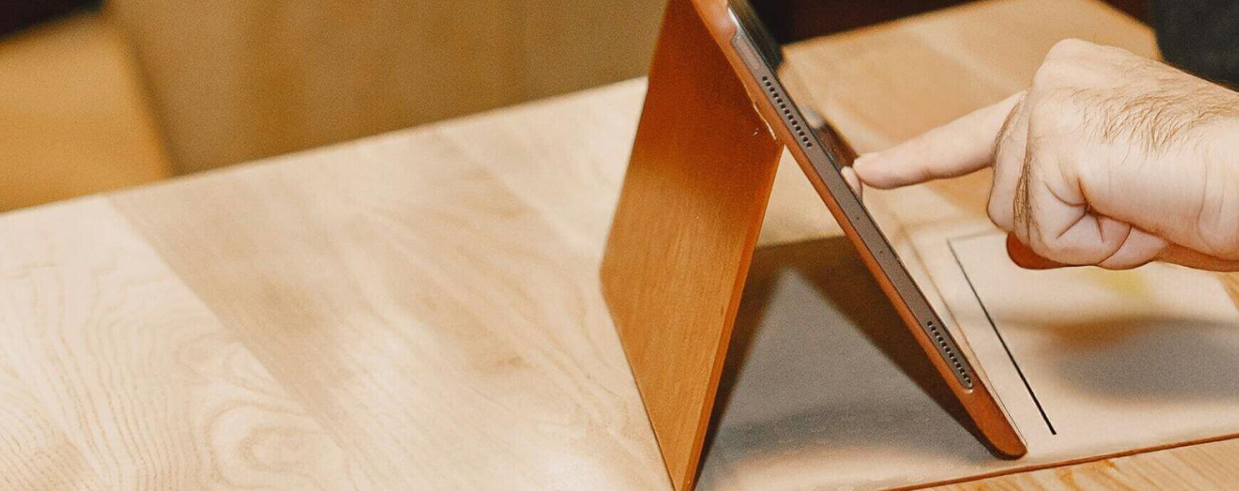 Person using tablet on desk - The hidden problem with general-purpose data